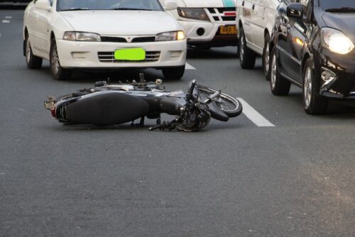 Motorcycle on its side