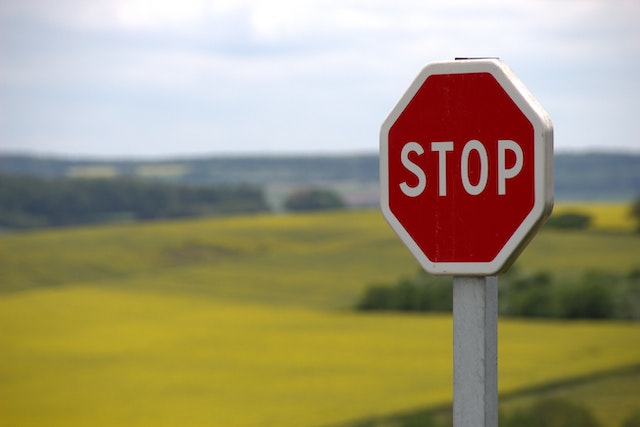 stop sign on country road