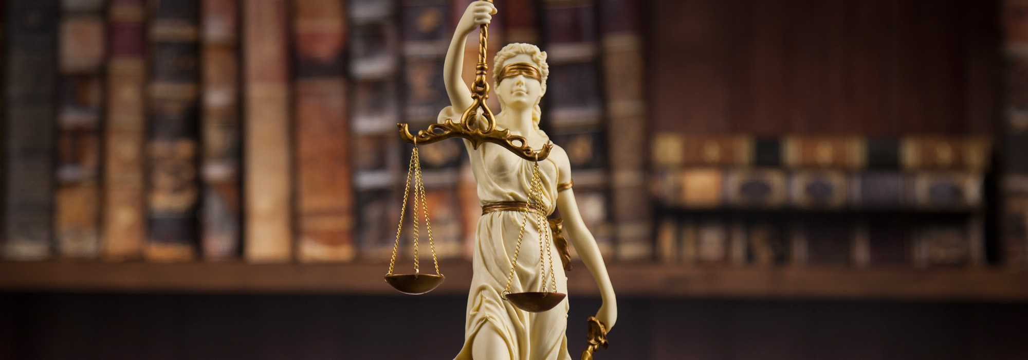 judge gavel and scales of justice and book background