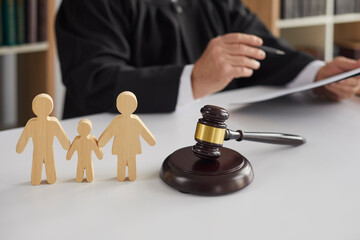 judge gavel and wooden family